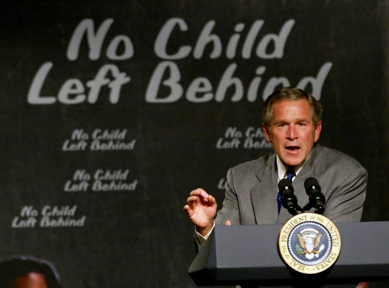 President George W. Bush speaks at an elementary school about No Child Left Behind in 2003.