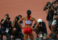 Allyson Felix of the United States celebrates winning gold in the Women's 200m Final on Day 12 of the London 2012 Olympic Games at Olympic Stadium on August 8, 2012 in London, England. (Photo by Paul Gilham/Getty Images)