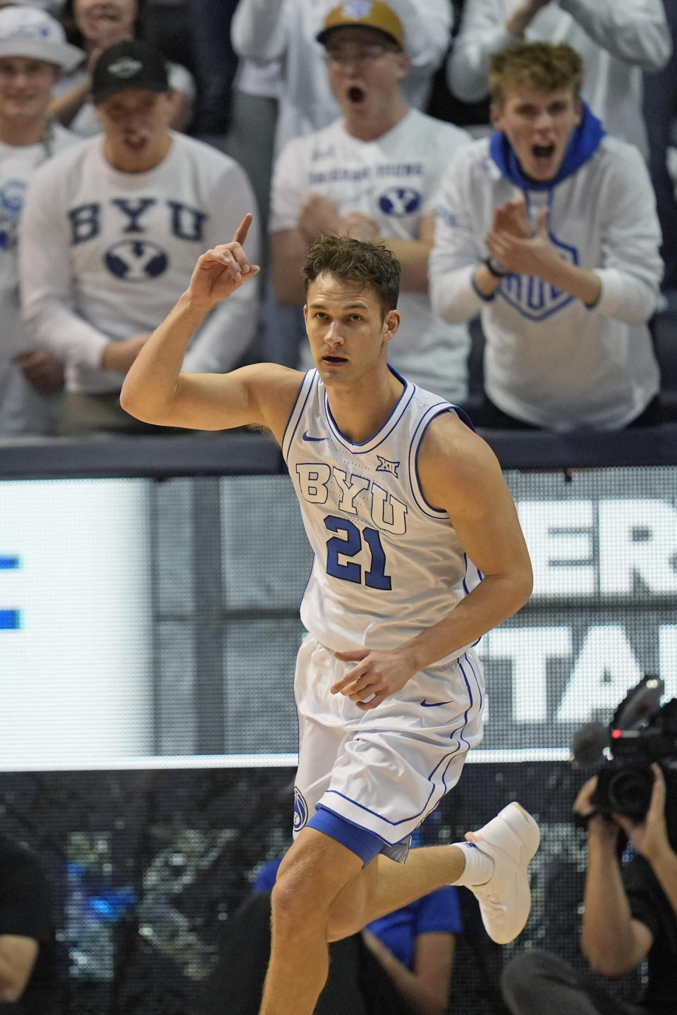 BYU guard Trevin Knell (21) celebrates after scoring against Central Florida during the first half of an NCAA college basketball game Tuesday, Feb. 13, 2024, in Provo, Utah. (AP Photo/Rick Bowmer)