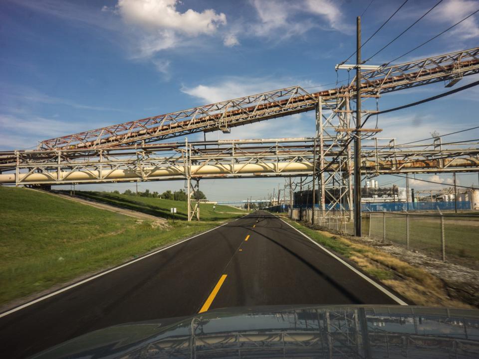 Chemical plants and factories line the roads and suburbs October 14, 2013.