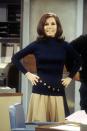 <p>Mary Tyler Moore embodied the <em>original</em> working girl, with a wardrobe of pleated mini skirts, shift dresses, and pantsuits to match—don't forget the elegantly-tied silk scarf to complete the look.</p>