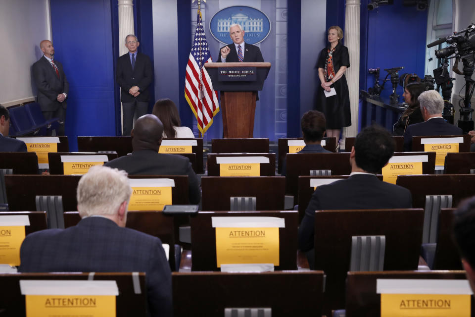 Vice President Mike Pence speaks about the coronavirus in the James Brady Briefing Room, Thursday, March 26, 2020, in Washington, as Dr. Anthony Fauci, director of the National Institute of Allergy and Infectious Diseases, and Dr. Deborah Birx, White House coronavirus response coordinator, listen. (AP Photo/Alex Brandon)