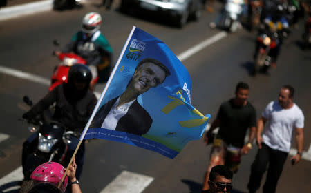 Supporters of Presidential candidate Jair Bolsonaro attend a rally in Taguatinga near Brasilia, Brazil September 5, 2018. REUTERS/Adriano Machado