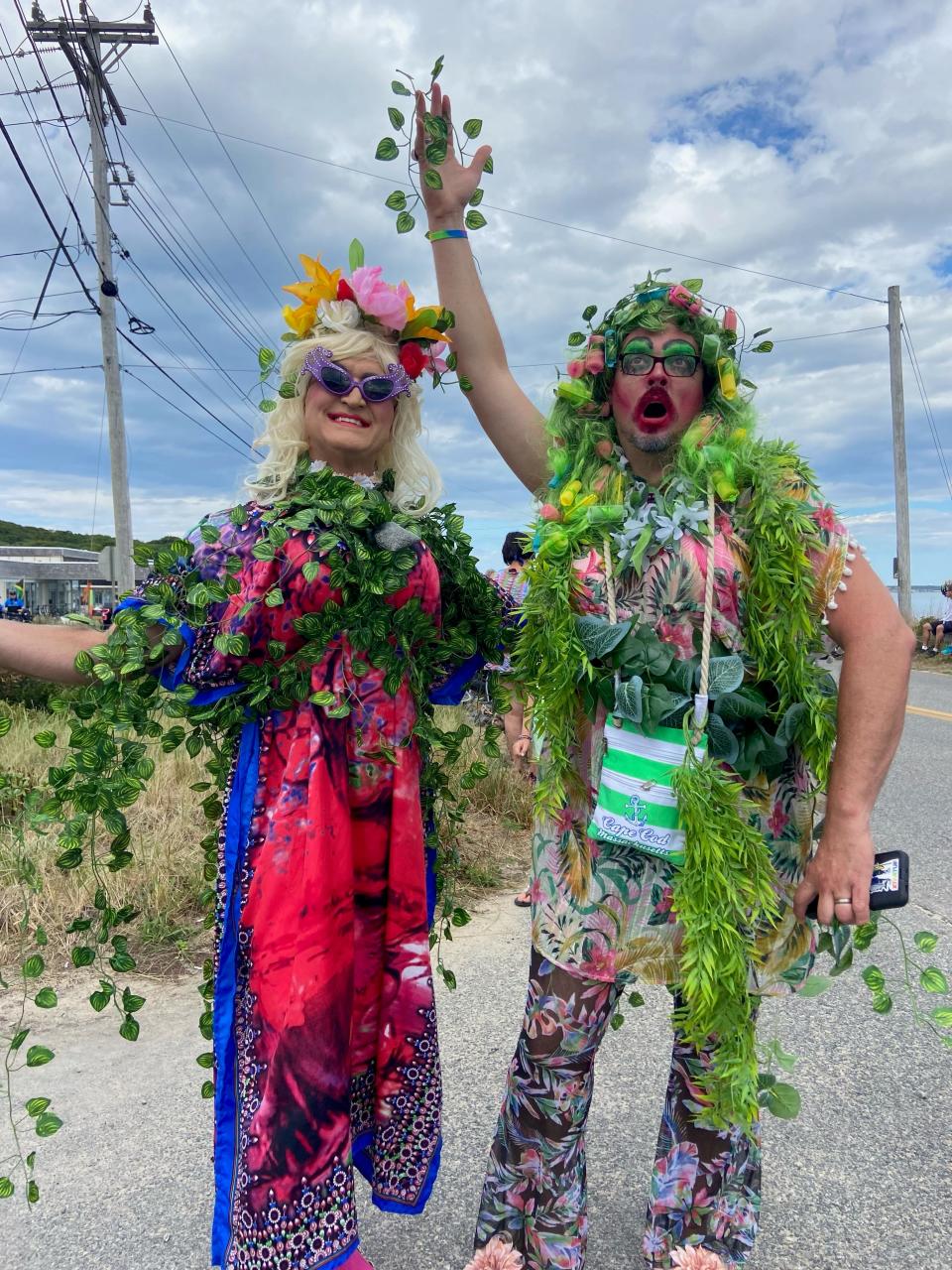 Andy Fagan (left) and Joe Hawk (right) dressed as "Mother Nature" at the Provincetown Carnival parade this year. They were standing on Commercial Street waiting to see the parade start on Thursday around 3 p.m. Fagan and Hawk have been coming to Carnival for about 10 years from their home in New York.