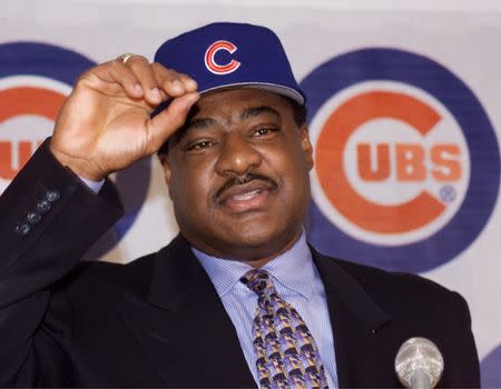 Don Baylor adjusts his new Chicago Cubs' ballcap at the press conference in Chicago's Wrigley Field, November 1, officially naming him as the 46th manager in the history of the team