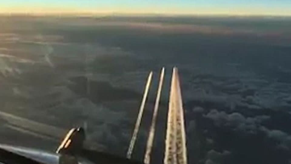 Footage captured from a British Airways plane flying 2,000 feet above 9W 118 shows the fighters flying alongside the Indian passenger jet. Source: Facebook