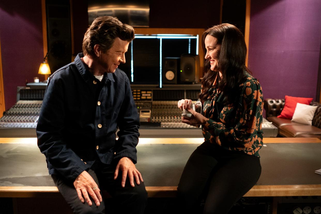 Specsavers audiologistSpecsavers audiologist Gurleen Brar shows Rick Astley the hearing aids in the studio (Jeff Moore/PA)