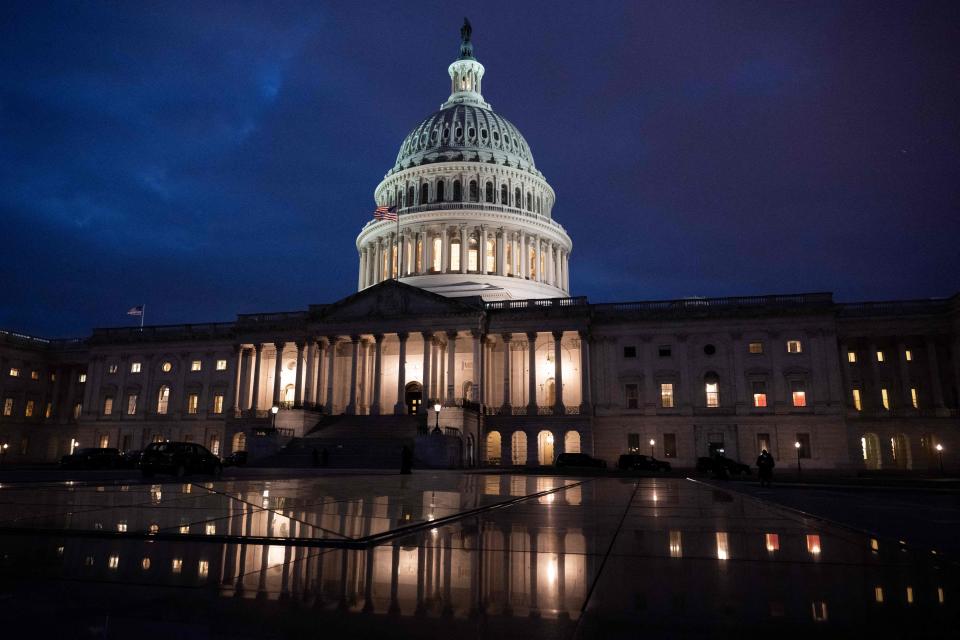 A view of the U.S. Capitol at night.