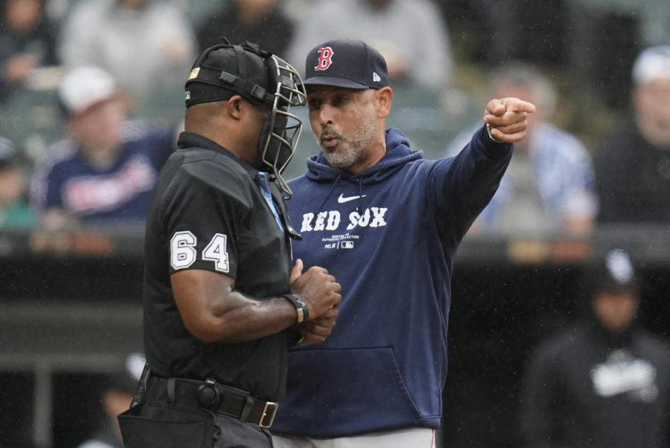 Boston Red Sox manager Alex Cora argues a strikeout call with umpire Alan Porter before being ejected during the fifth inning of a baseball game against the Chicago White Sox, Saturday, June 8, 2024, in Chicago. (AP Photo/Erin Hooley)