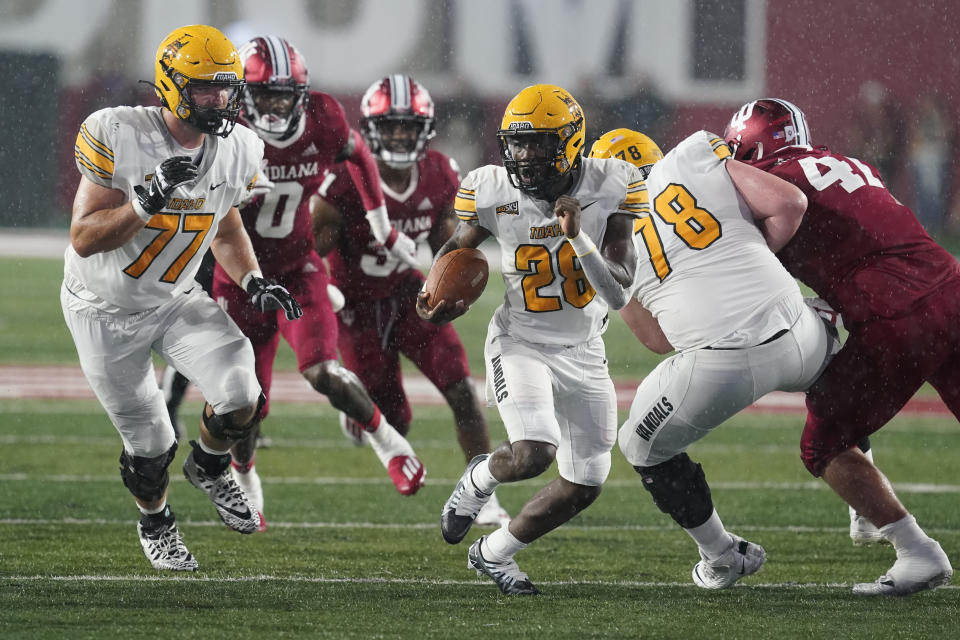 Idaho running back Anthony Woods (28) carries during the first half of the team's NCAA college football game against Indiana, Saturday, Sept. 10, 2022, in Bloomington, Ind. (AP Photo/Darron Cummings)