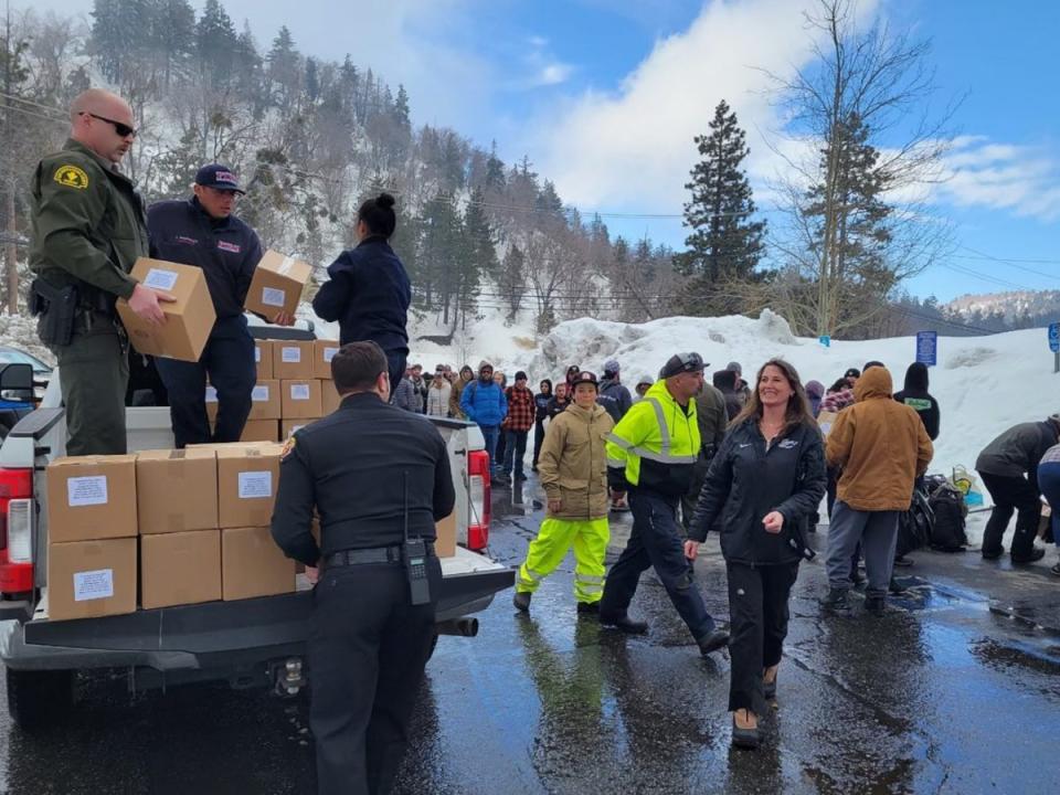 The San Bernadino County Sheriff’s Department distributes supplies (Facebook / The San Bernadino County Sheriff’s Department)