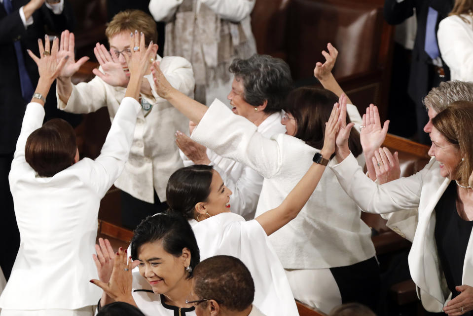 Members of Congress cheer after President Donald Trump acknowledges more women in Congress during his State of the Union address to a joint session of Congress on Capitol Hill in Washington, Tuesday, Feb. 5, 2019.(AP Photo/J. Scott Applewhite)