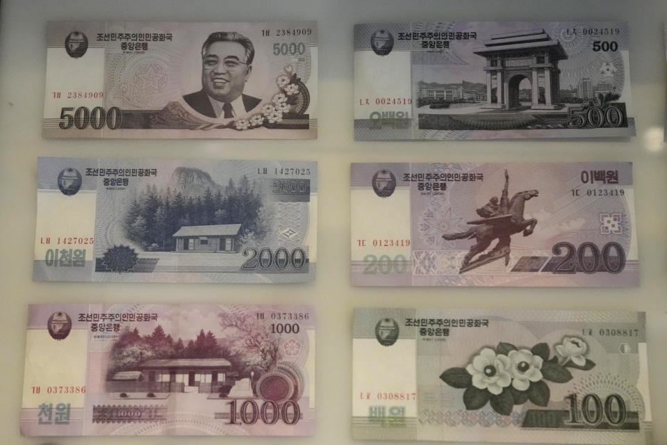 North Korean bank notes are displayed at an exhibition hall of the observation post in Ganghwa, South Korea, on May 11, 2023. North Korea has tolerated the widespread use of more stable foreign currencies like U.S. dollars and Chinese yuan since a bungled revaluation of the won in 2009 triggered runaway inflation and public unrest. The so-called “dollarization” helped ease inflation and stabilize exchange rates, enabling leader Kim Jong Un to establish a stable hold on power after he inherited that role in late 2011. (AP Photo/Lee Jin-man)