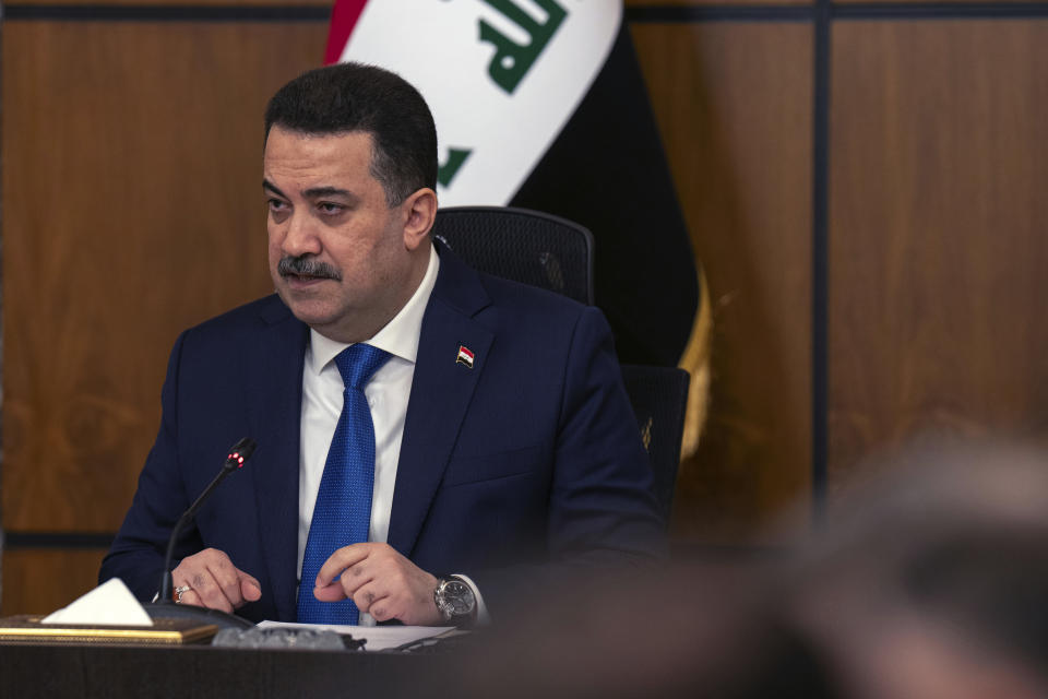 Iraqi Prime Minister Mohammed Shia al Sudani chairs the first round of the negotiations between Iraq and the United States to end the International Coalition mission in Baghdad, Iraq, Saturday, Jan. 27, 2024. (AP Photo/Hadi Mizban, Pool)