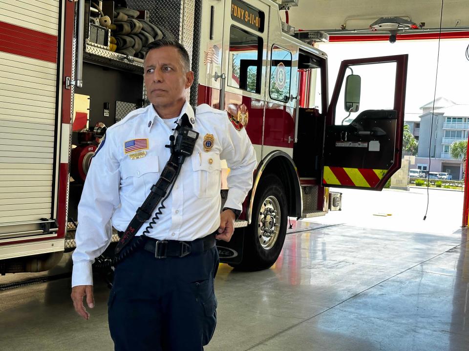 Martin County Fire Rescue Captain Chuck Gordils walks away from a firetruck at Fire Station 14 near Stuart Beach on October 20, 2023 as he says goodbye to colleagues before deploying to volunteer in Israel.