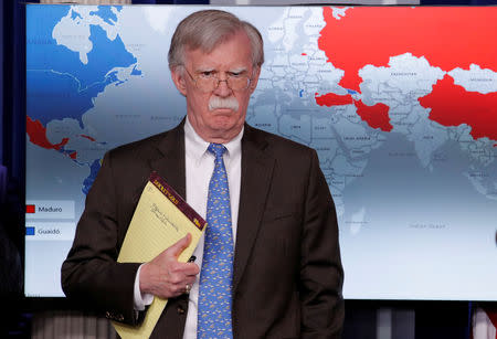 FILE PHOTO - U.S. National Security Adviser John Bolton arrives to address reporters as the Trump administration announces economic sanctions against Venezuela and the Venezuelan state owned oil company Petroleos de Venezuela (PdVSA) during a press briefing at the White House in Washington, U.S., January 28, 2019. REUTERS/Jim Young/File Picture