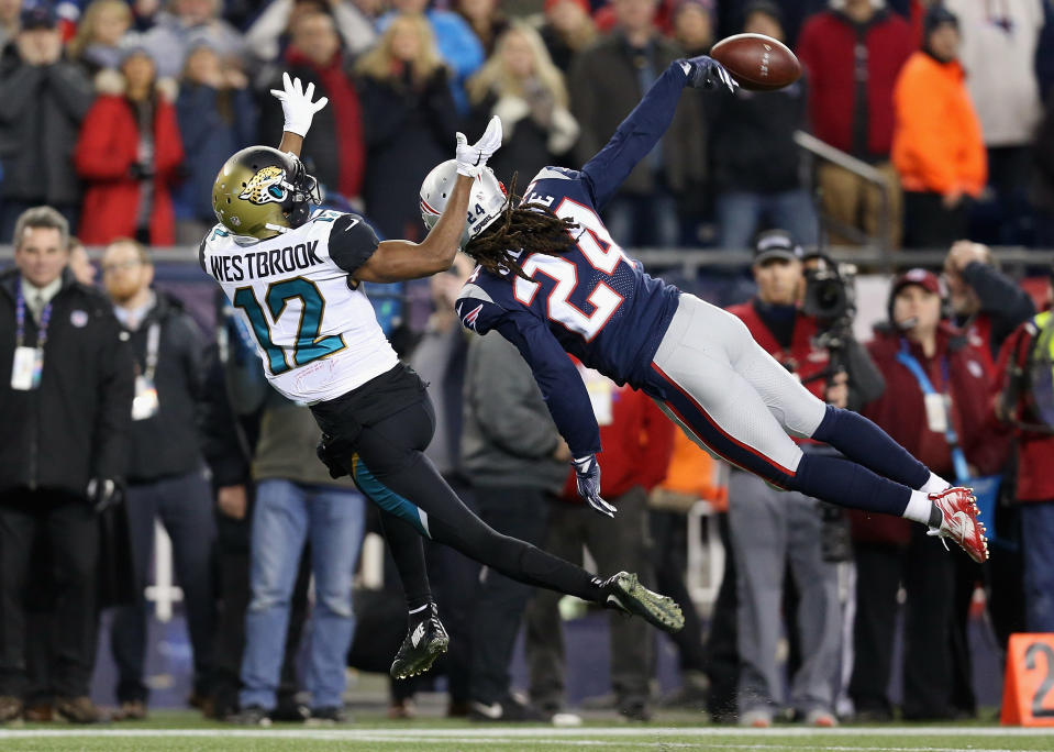 <p>Stephon Gilmore #24 of the New England Patriots deflects a pass intended for Dede Westbrook #12 of the Jacksonville Jaguars in the fouorth quarter during the AFC Championship Game at Gillette Stadium on January 21, 2018 in Foxborough, Massachusetts. (Photo by Kevin C. Cox/Getty Images) </p>