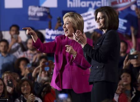 U.S. Democratic presidential candidate Hillary Clinton (L) appears on stage with Nevada Senate candidate Catherine Cortez Masto at a campaign rally at the Laborers International Union hall in Las Vegas, Nevada February 18, 2016. REUTERS/David Becker/File Photo