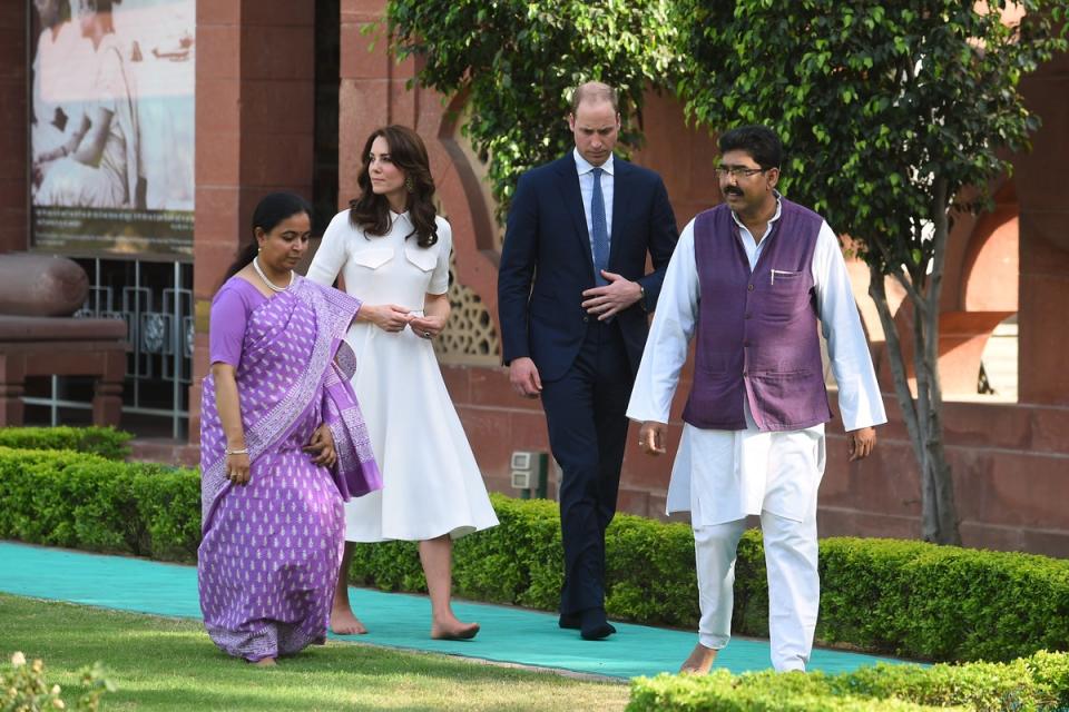 Catherine, Duchess of Cambridge and Prince William, Duke of Cambridge walk barefoot paying their respects at Gandhi Smriti, a museum located in Old Birla House, where Mahatma Gandhi, India's founding father, spent the last few years of his life, on April 11, 2016 (Getty Images)