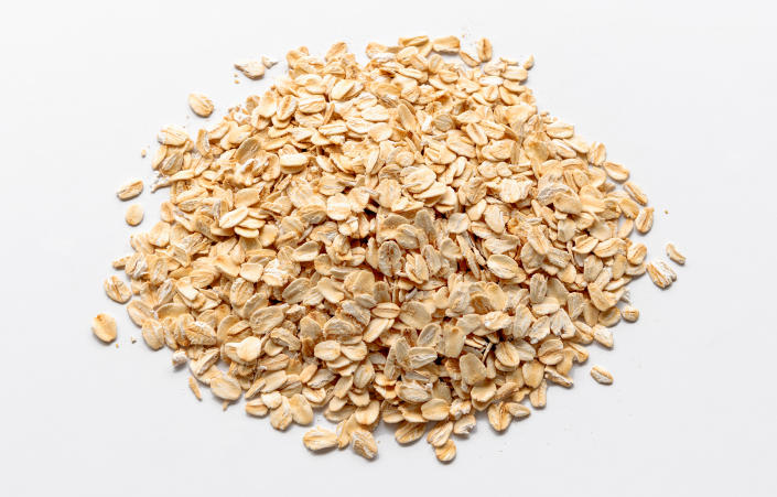 Rolled oats on a white background (Nora Carol Photography / Getty Images)