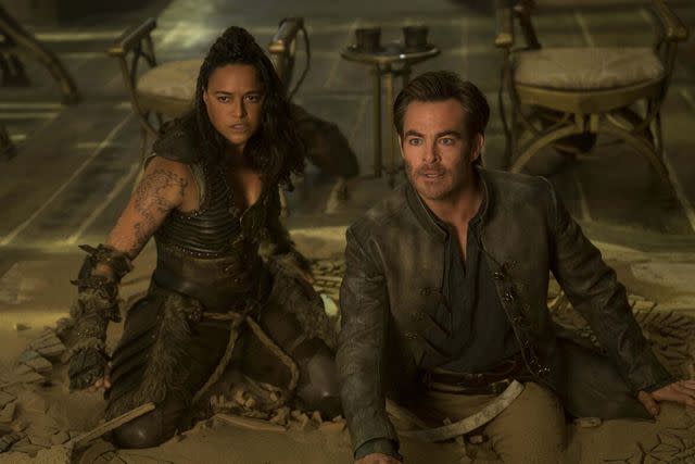 <p>PARAMOUNT PICTURES/Moviestore/Shutterstock</p> Michelle Rodriguez and Chris Pine in <i>Dungeons & Dragons: Honor Among Thieves</i>, 2023