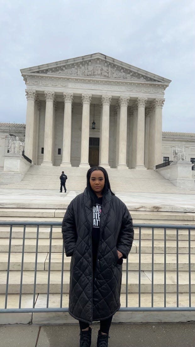 Hill outside the U.S. Supreme Court on the day of oral arguments in the student loan forgiveness case