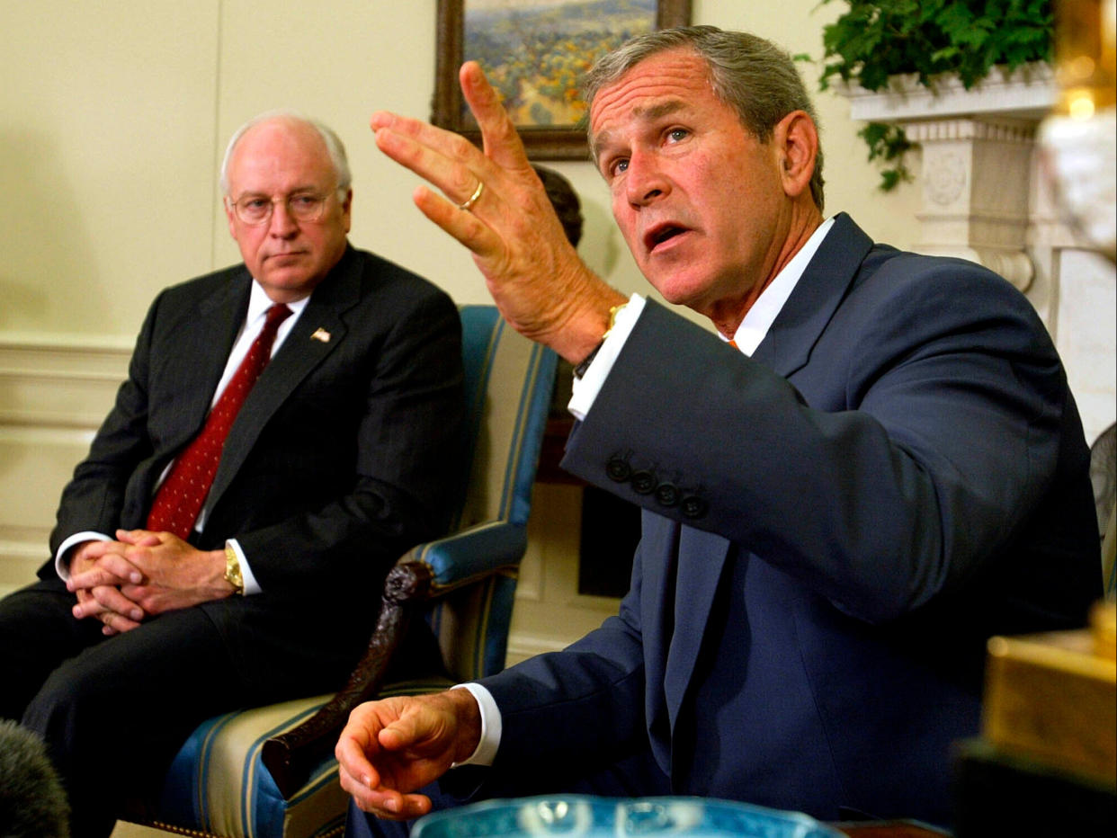 The bad old days: George W Bush and Dick Cheney (AP)