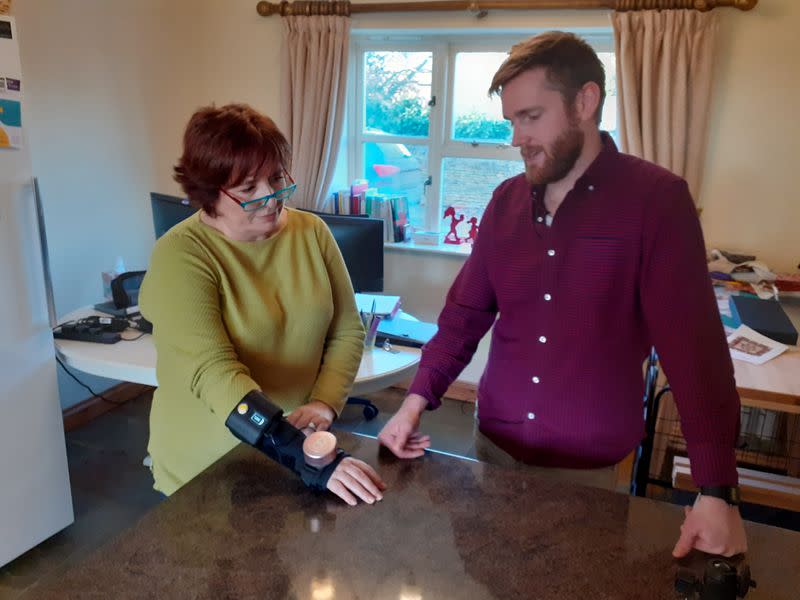 FILE PHOTO: Business analyst Field wears a glove with a built-in spinning gyroscope near Towcester