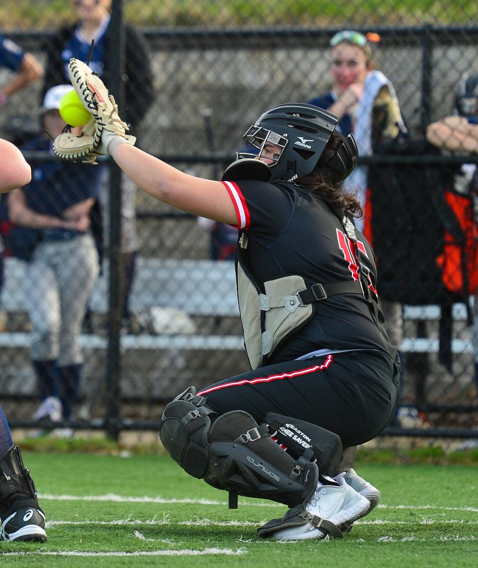 Durfee catcher Sadie Fitzgerald goes up high for a pitch out of the strike zone during a recent game at home against Somerset Berkley