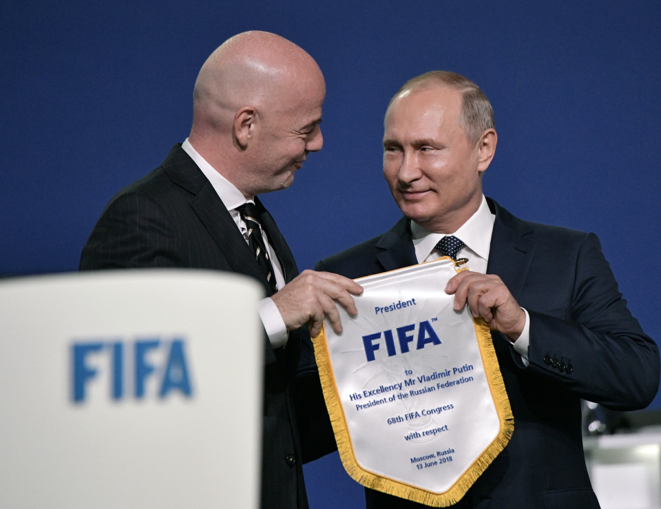 Gianni Infantino, left, and Russian President Vladimir Putin