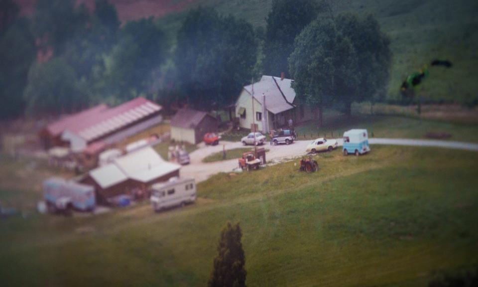 An arial photo framed on David Cox's wall Monday, Oct. 2, 2023, shows his former property in English, Indiana, before he made additions for he and his family's many hobbies and businesses.