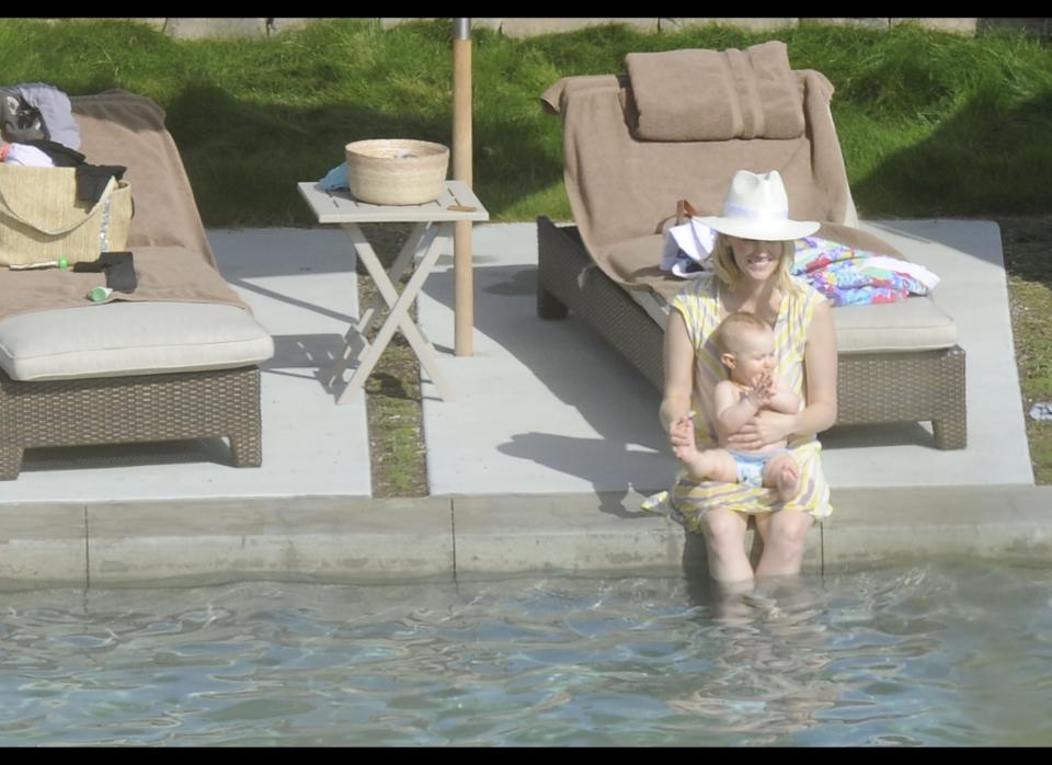 January Jones and baby Xander hang out by the pool in Topanga Canyon, Calif., in April 2012. (FameFlynet)