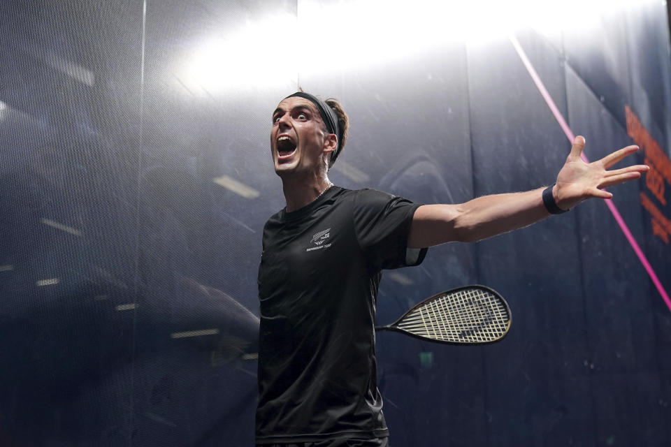 New Zealand's Paul Coll celebrates beating Wales' Joel Makin in the Men's Singles gold medal match at the University of Birmingham Hockey and Squash Centre on day six of the 2022 Commonwealth Games in Birmingham, England, Wednesday, Aug. 3, 2022. (Zac Goodwin/PA via AP)