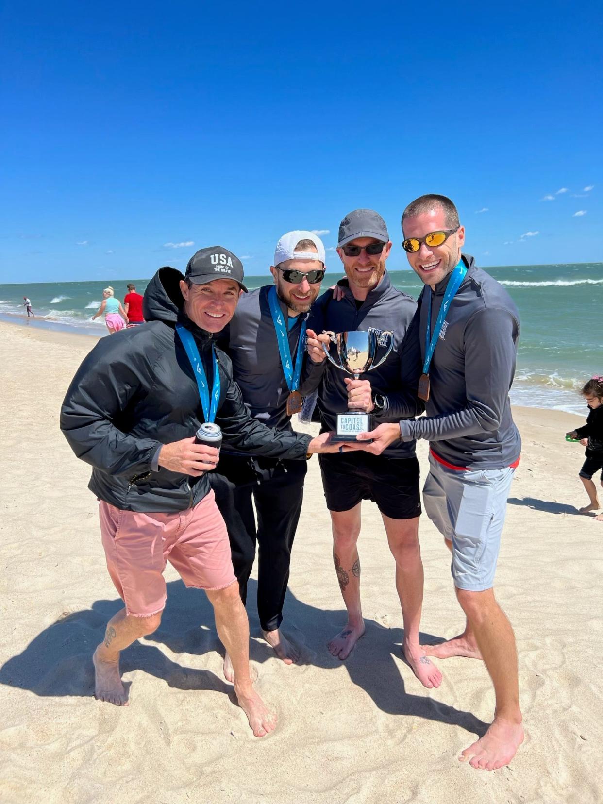 Mickey Moore, Paul Guyas, Darien Angelier and Bob Reifinger (missing Elyse Gallegos and Trevor Foley) from their Capitol to Coast team, Saturday, April 9, 2022, which finished finished 3rd in a time of 9:01:39 teams, good enough for a nice trophy.