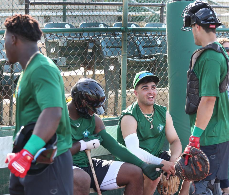 Daytona's Sal Stewart chats with a teammate during preseason batting practice, Thursday, April 6, 2023 at Jackie Robinson Ballpark.