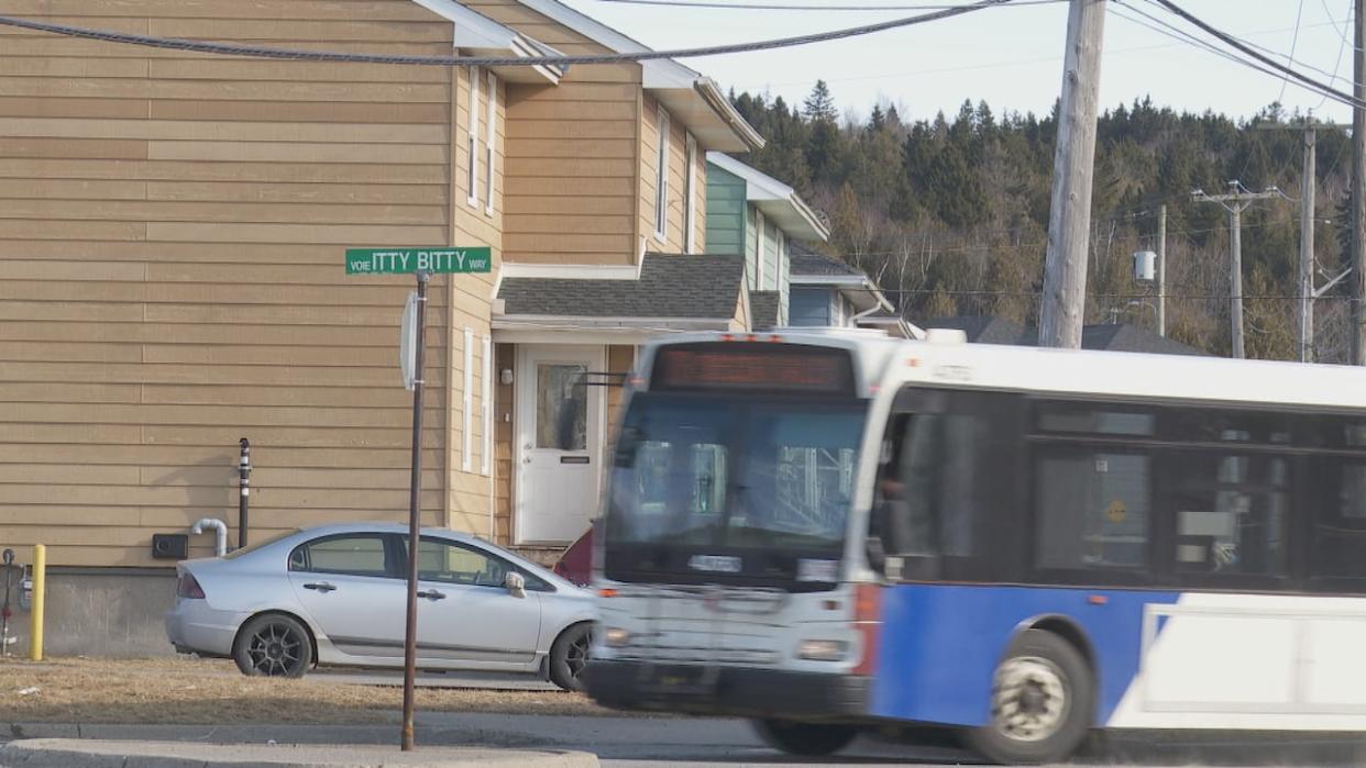 A Saint John Transit bus driving through the site where a 71-year-old Saint John woman was struck by a bus Tuesday evening. (Graham Thompson/CBC - image credit)