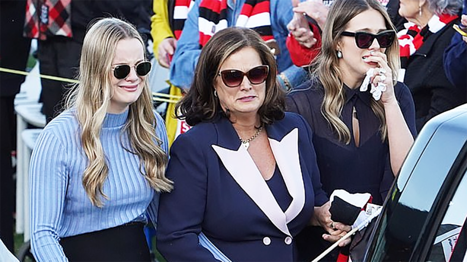 Danny Frawley's wife and daughters, pictured here during his memorial service.