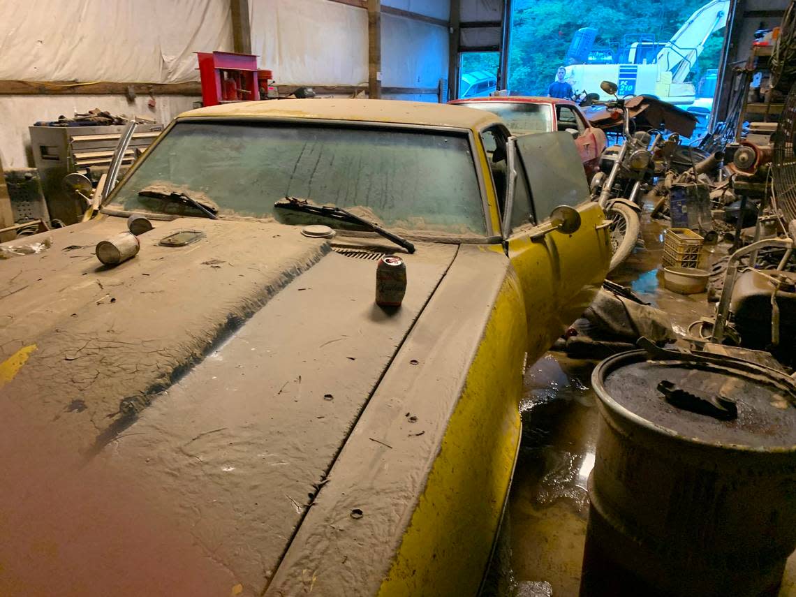 Kelly Smith took a photo from inside his garage of his two ruined 1960s Camaro sportscars.