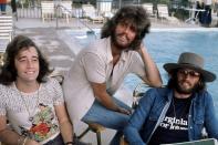 <p>The Bee Gees hang at the pool in 1974. </p>
