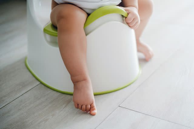 <p>Getty</p> Infant sitting on a potty (stock image)