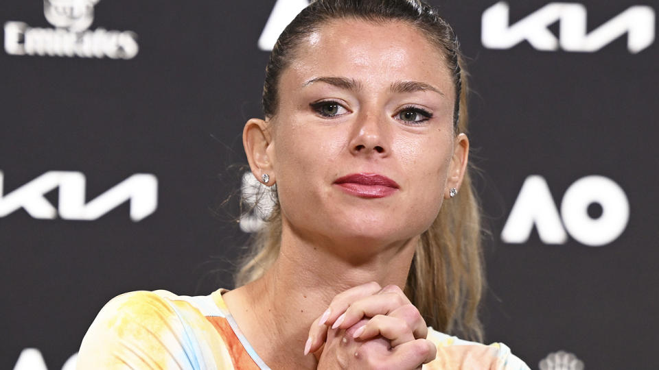 Camila Giorgi listens to a question in a press conference at the Australian Open.