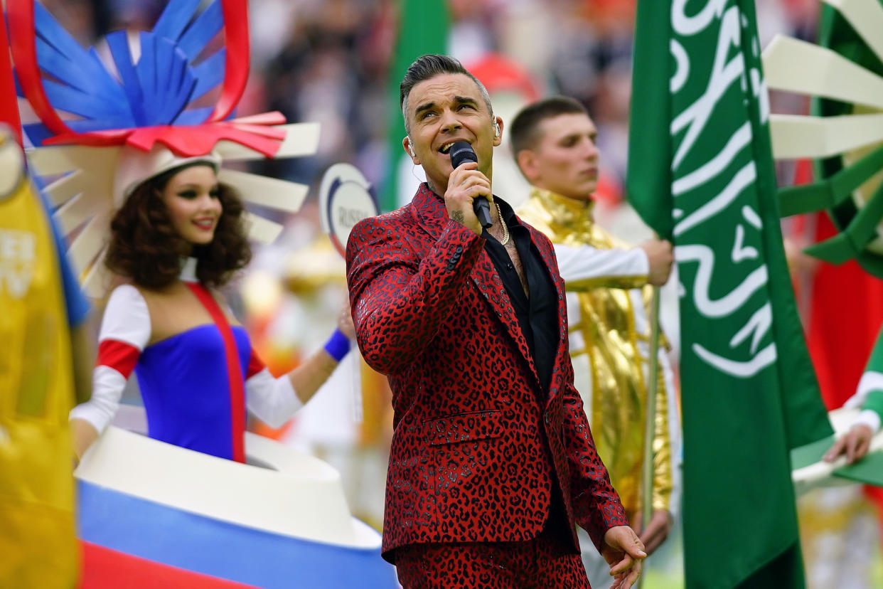 MOSCOW, RUSSIA - JUNE 14: Robbie Williams performs during the 2018 FIFA World Cup Russia Opening Ceremony prior to group A match between Russia and Saudi Arabia at Luzhniki Stadium on June 14, 2018 in Moscow, Russia. (Photo by Carlos Cuin/Jam Media/Getty Images )