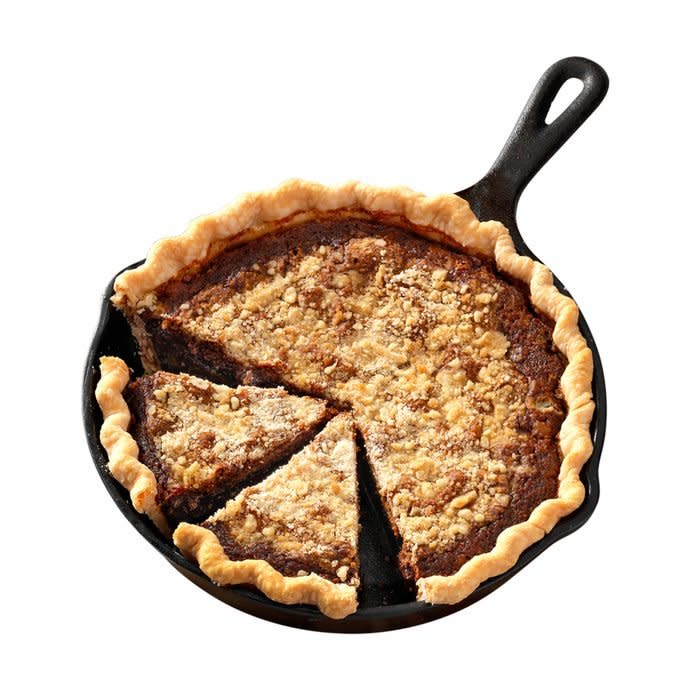 Shoofly pie in a pan with a few slices cut out