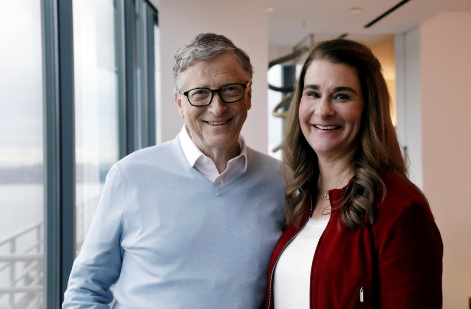 In this Feb. 1, 2019 photo, Bill and Melinda Gates pose for a photo in Kirkland, Wash.  (AP Photo/Elaine Thompson)