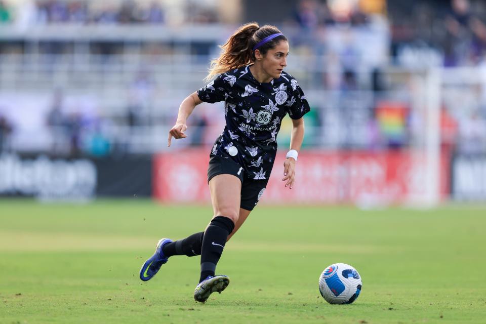 May 18, 2022; Louisville, Kentucky, USA;  Racing Louisville FC player Savannah Demelo (7) handles the ball during the first half against the San Diego Wave FC at Lynn Family Stadium. Mandatory Credit: Aaron Doster-USA TODAY Sports
