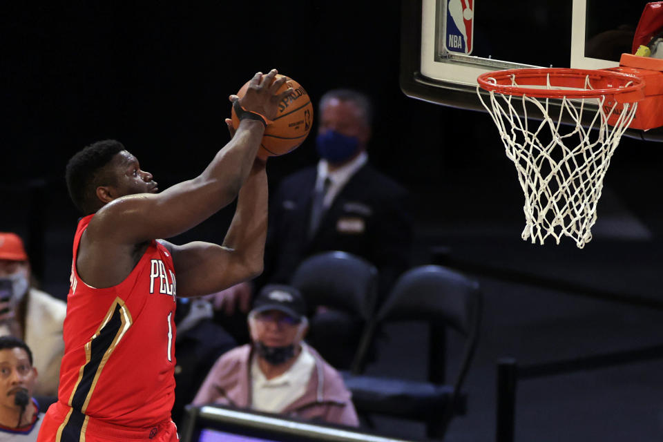 New Orleans Pelicans forward Zion Williamson (1) dunks the ball against the New York Knicks during the second half of an NBA basketball game Sunday, April 18, 2021, in New York. (AP Photo/Adam Hunger, Pool)