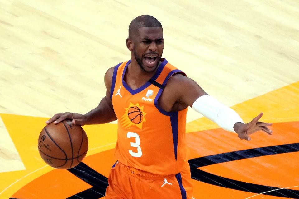 Phoenix Suns guard Chris Paul (3) calls out a play against the New York Knicks during the first half of an NBA basketball game Friday, May 7, 2021, in Phoenix. (AP Photo/Rick Scuteri).