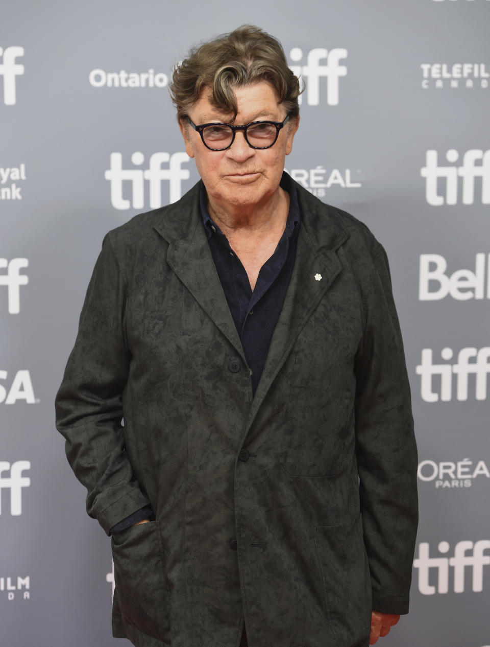 FILE - Robbie Robertson attends a press conference for "Once Were Brothers: Robbie Robertson and The Band" on day one of the Toronto International Film Festival on Thursday, Sept. 5, 2019, in Toronto. Robertson, the lead guitarist and songwriter for The Band, whose classics include “The Weight,” “Up on Cripple Creek” and “The Night They Drove Old Dixie Down,” has died at 80, according to a statement from his manager. (Photo by Chris Pizzello/Invision/AP, File)