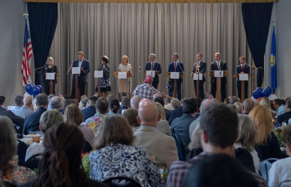 Republican congressional candidates stand on stage during a debate for the 5th district at the Memorial Building in Columbia, Tenn., Monday, June 27, 2022.