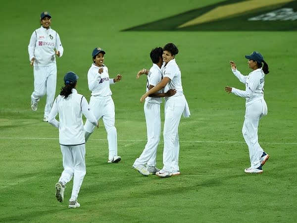 Indian players celebrate the fall of an Australia wicket. (Photo: Twitter/BCCI Women)